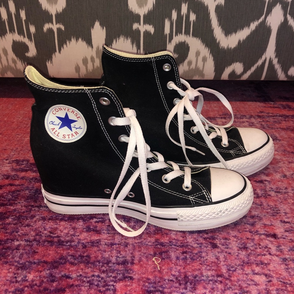 black CONVERSE wedges high tops.